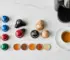 Капсульный кофе — капсулы Tassimo, Dolce Gusto и Nespresso рядом с кофемашиной